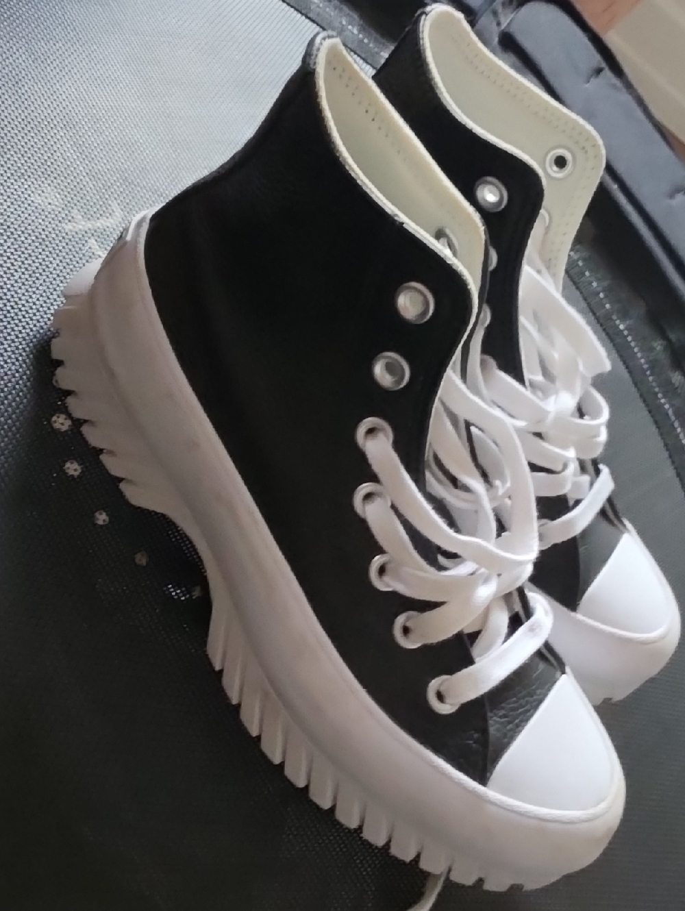 Converse Women’s Black High-Top Sneakers with White Lug Sole
